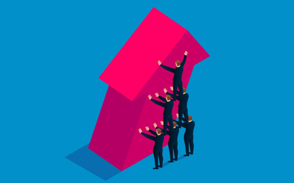 All are united, businessmen form a humanoid pyramid to prevent the red arrow from collapsing