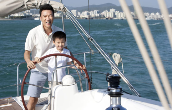 Father teaching son Sailing